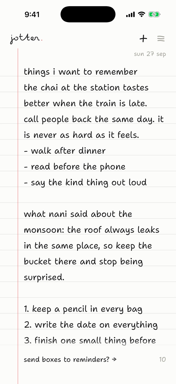 A page in jotter: lines of handwriting on ruled paper with a red margin